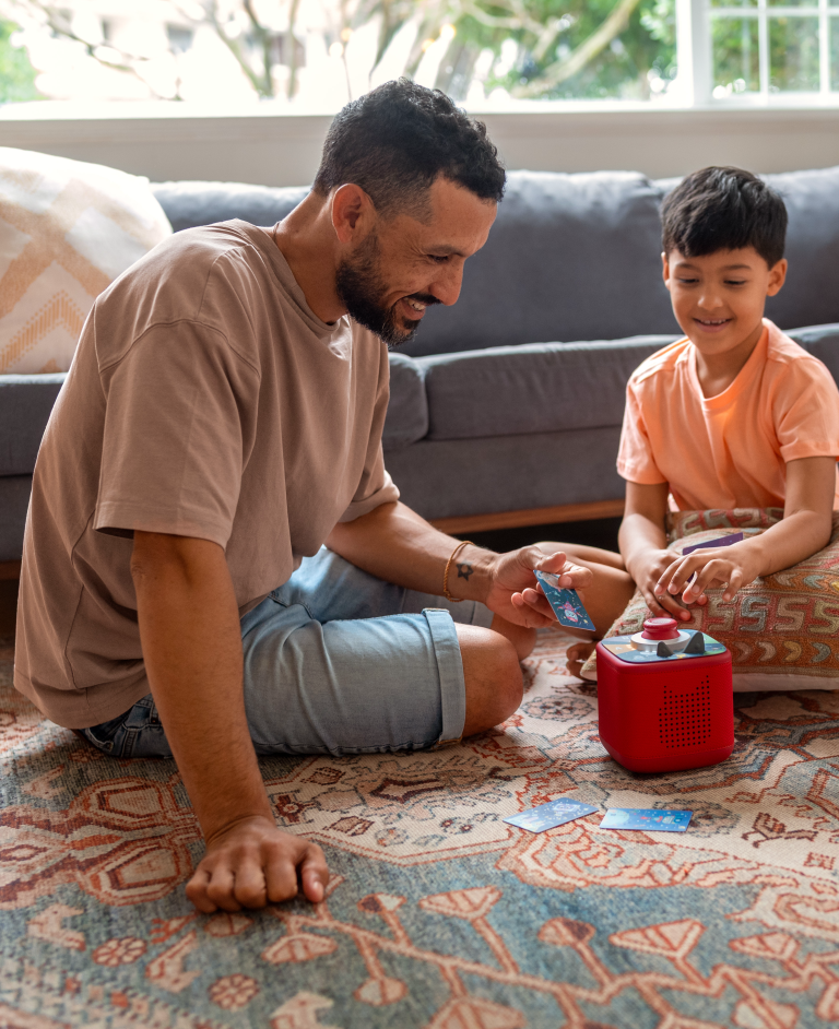 Dad and son playing with Tonies